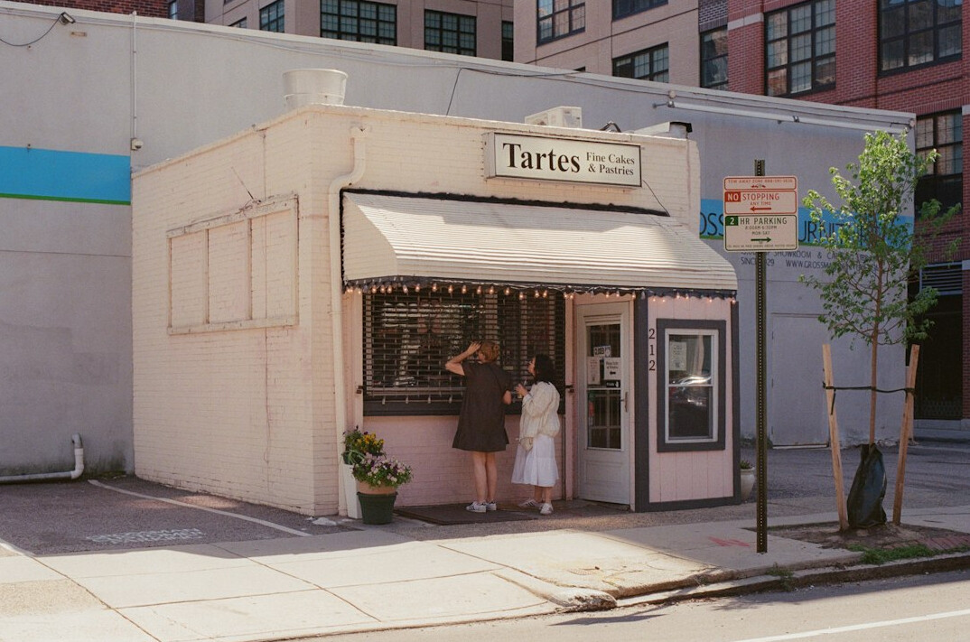 Danish baker kneading dough in a small neighborhood bakery