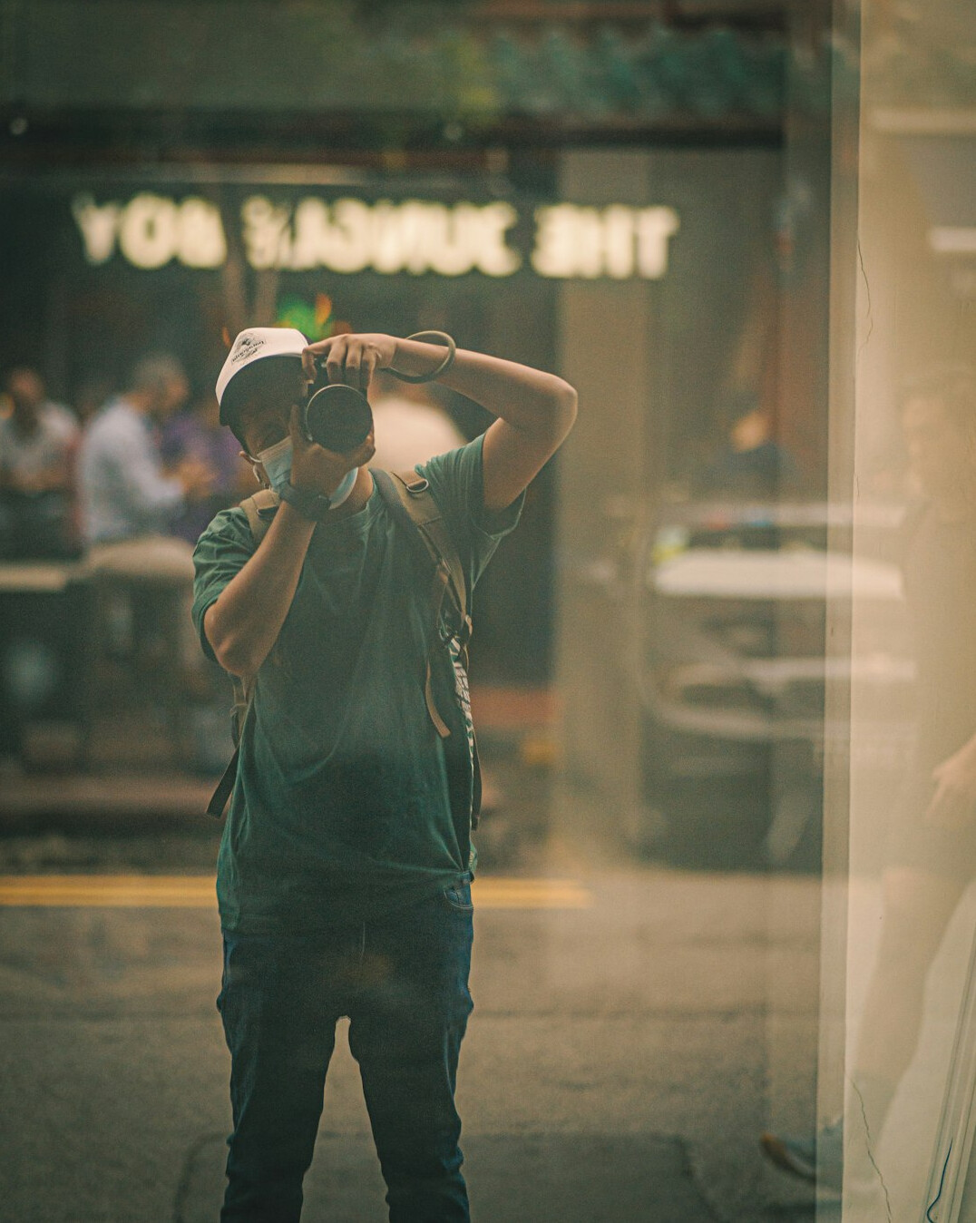 photographer capturing street scene